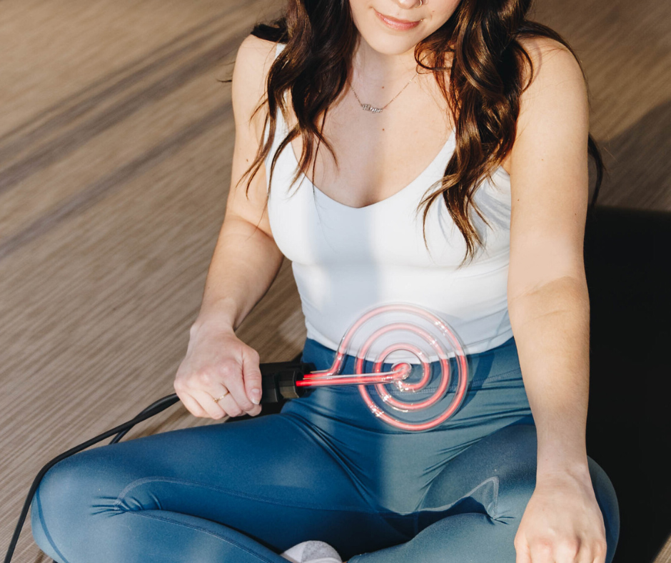 Woman using the Reliever Bulb on her abdomen