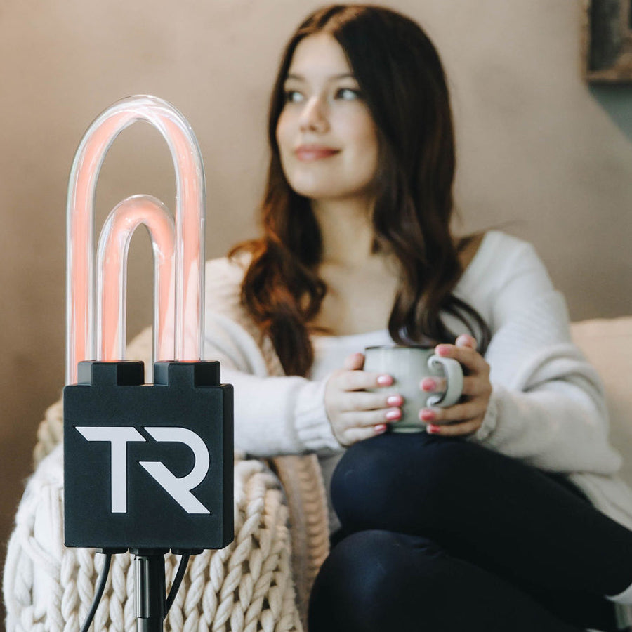 Woman relaxing on a couch during a SuperNova session