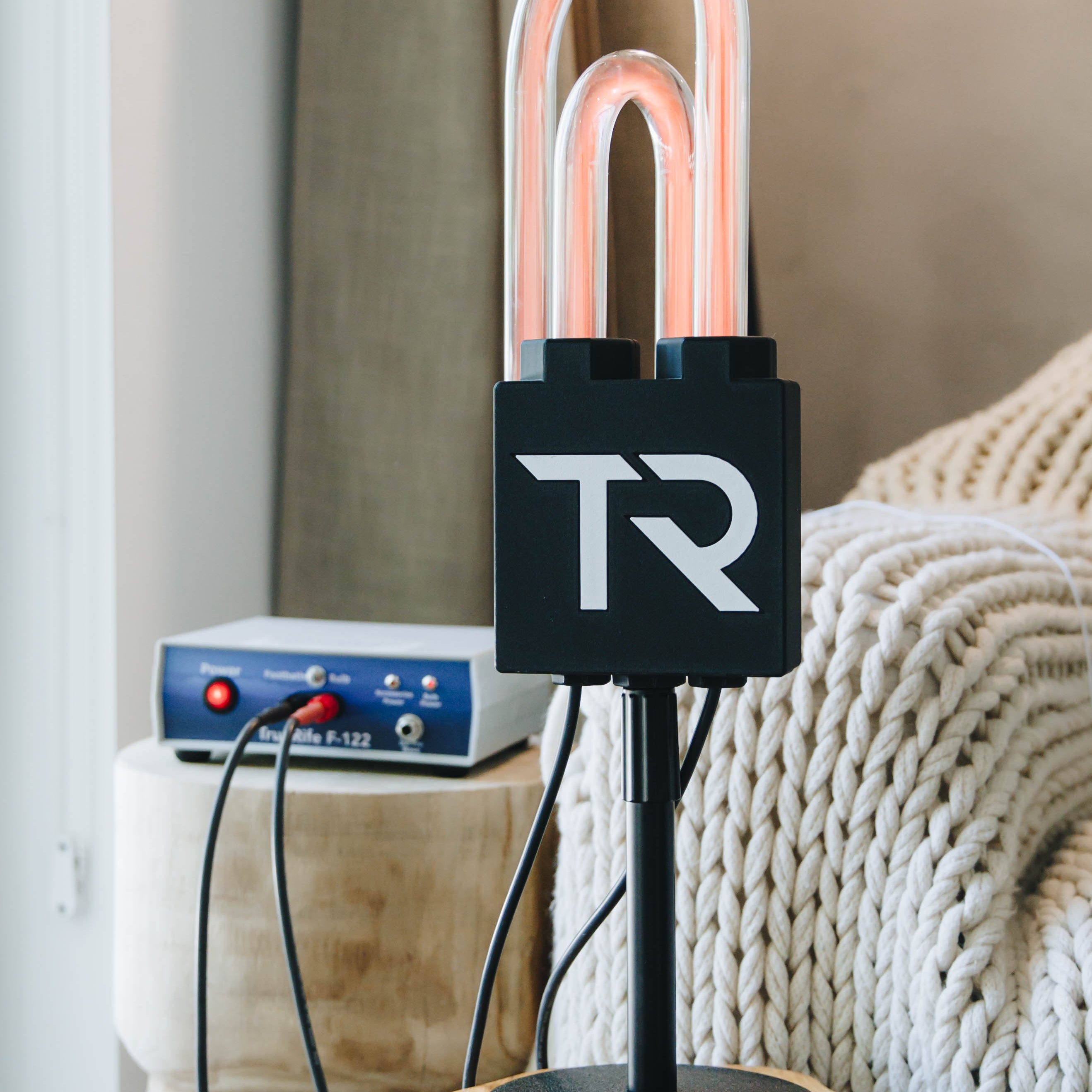 TrueRife SuperNova on desktop stand connected to the F-122 Generator